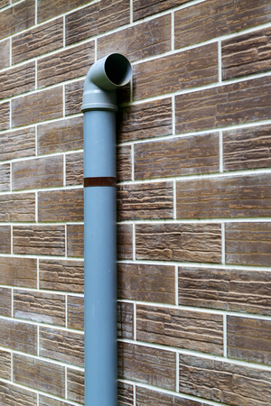 House wall with ventilation tube