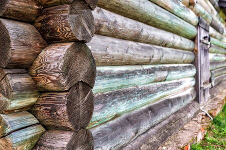 Old log house wall in an abandoned placeの写真素材