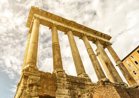 Temple of Saturn in the Roman Forum in Rome, Italyの写真素材