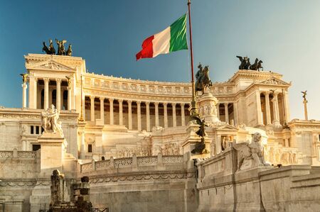 The Vittoriano building on the Piazza Venezia at sunset in Rome, Italyの写真素材