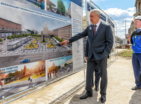 MOSCOW - JUNE 11, 2015: Moscow Mayor S. Sobyanin visits the Triumph Square. This is one of the central squares of Moscow, which conducted large-scale reconstruction.のeditorial素材