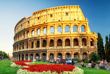 ROME - OCTOBER 4, 2012: The Colosseum (Coliseum) at sunset. The Colosseum is a major tourist attraction in Rome.のeditorial素材