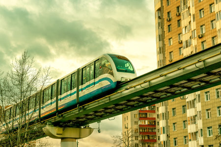 A monorail train runs above the street in Moscow, Russiaのeditorial素材