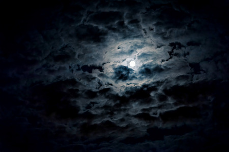 Mysterious night sky with full moonの写真素材