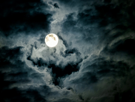 Mysterious night sky with full moonの写真素材