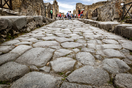 POMPEII, ITALY - MAY 13, 2014: The ancient street. Pompeii is an ancient Roman city died from the eruption of Mount Vesuvius in 79 AD.のeditorial素材