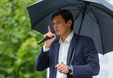 MOSCOW - JULY 27, 2016: State Duma deputy Dmitry Gudkov speaks to voters. Dmitry Gudkov is one of the leaders of the opposition in Russia.のeditorial素材