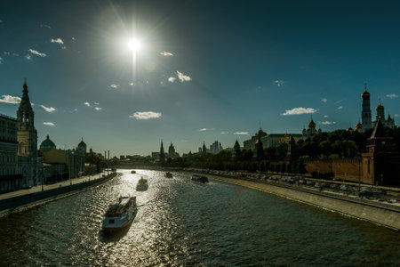 Tourist boats floats on the Moskva River past the Moscow Kremlin, Russiaのeditorial素材