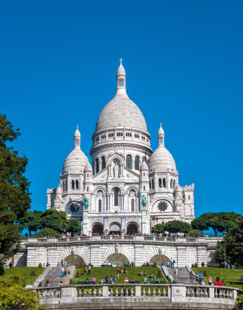 PARIS - SEPTEMBER 24, 2013: Basilica of the Sacred Heart of Jesus (Basilique du Sacre-Coeur). A popular landmark, it is located at the summit of the Montmartre hill, the highest point in Paris.のeditorial素材