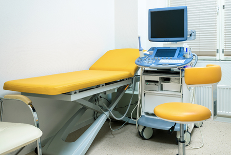 Mobile hospital bed with medical equipments in a clinic roomの写真素材