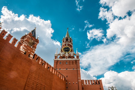 The Moscow Kremlin with the Spasskaya tower in the Red Square, Russia. The Moscow Kremlin is the residence of the Russian president and the main tourist attraction of Moscow.のeditorial素材