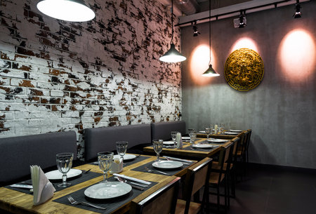 Moscow - August 5, 2017: Interior of a Thai restaurant with brick wallのeditorial素材