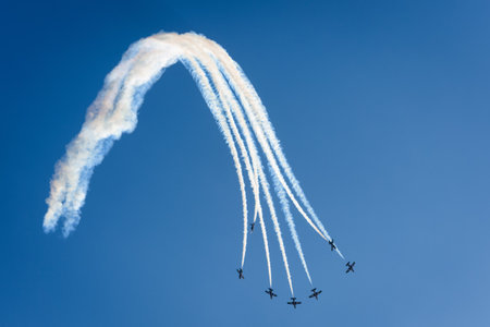 Moscow Region - July 21, 2017: Aerobatic display team from the United Arab Emirates in the blue sky at the International Aviation and Space Salon (MAKS) in Zhukovsky.のeditorial素材