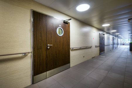 Moscow - July 25, 2017: Corridor in a modern hospital with wooden doorsのeditorial素材