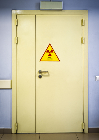 Door to X-ray cabinet in the clinicの写真素材