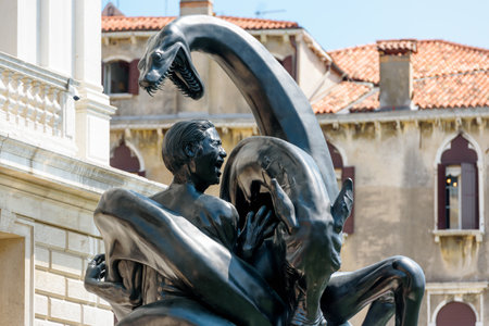 Venice, Italy - May 18, 2017: Sculpture by Damien Hirst outside the Palazzo Grassi next to the Grand Canal. Damien Hirat`s new exhibition opened in Venice in April 2017.のeditorial素材