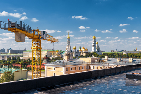 Modern urban construction in central Moscow, Russia. Moscow Kremlin in the background.の写真素材