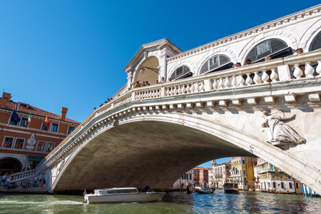 Venice, Italy - May 21, 2017: Rialto Bridge with tourists over the Grand Canal. Rialto Bridge (Ponte di Rialto) is one of the main tourist attractions of Venice.のeditorial素材