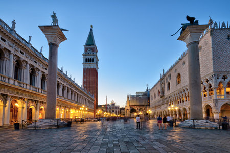 Piazza San Marco (Saint Mark`s Square) with old Doge's Palace at night in Venice, Italy. This square is the main tourist destination in Venice.のeditorial素材