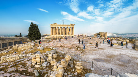 Athens, Greece - May 8, 2018: Panoramic view of Acropolis with Parthenon. Ancient ruins at the top of mount in Athens centre. Acropolis is the main tourist attraction of city. People visit Acropolis.のeditorial素材