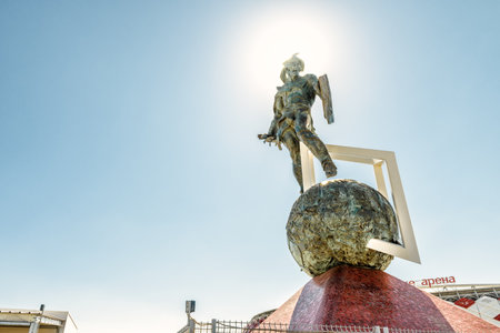 Moscow, Russia - May 11, 2018: Statue of Spartacus at Otkritie Arena (Spartak stadium). Ancient Roman gladiator on blue sky background. Spartak Stadium has been selected for the 2018 FIFA World Cup.のeditorial素材