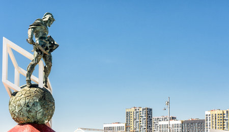 Moscow, Russia - May 11, 2018: Statue of Spartacus at Spartak stadium. Ancient Roman gladiator on blue sky background with copy space. Spartak Stadium has been selected for the 2018 FIFA World Cup.のeditorial素材