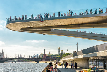 Moscow - June 16, 2018: Floating bridge in Zaryadye Park near Moscow Kremlin, Russia. Zaryadye is one of the main tourist attractions of Moscow. Amazing view of the hovering bridge above Moskva River.のeditorial素材
