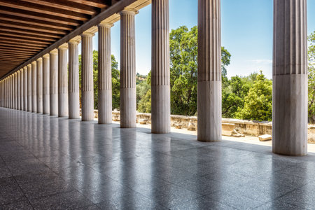 Stoa of Attalos in ancient Agora, Athens, Greece. It is one of the main tourist attractions of Athens. Panoramic view of Stoa columns with perspective. Restored historical architecture of Athens.のeditorial素材