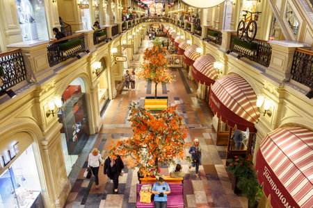 Moscow - August 22, 2018: Inside the GUM (main department store) on Red Square, Moscow, Russia. GUM is one of the oldest supermarkets in Moscow and tourist attraction. Luxury interior of Moscow store.のeditorial素材