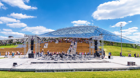 Moscow - June 17, 2018: Modern amphitheater with a glass dome in Zaryadye Park in Moscow, Russia. Zaryadye is one of the main landmarks of Moscow. Stage of theater in the Moscow center in summer.のeditorial素材