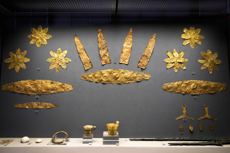 Athens - May 7, 2018: Gold jewelry from ancient Greek Mycenae. Golden crowns and other precious objects in the National Archaeological Museum in Athens, Greece.のeditorial素材