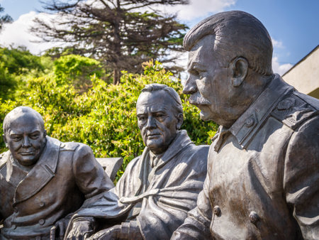 Yalta, Russia - May 17, 2016: Soviet leader Stalin with Churchill and Roosevelt. Bronze statue by Zurab Tsereteli in the Livadia Palace, Crimea. The famous Conference was held there in 1945.のeditorial素材