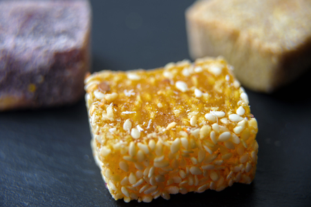 Arab sweets on dark background. Middle eastern dessert food from natural fruits. Turkish delight...