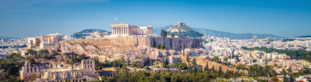 Panorama of Athens with the Acropolis hill, Greece. Famous Acropolis is a top landmark of Athens. Scenic view of the Athens city in summer. Cityscape of old Athens with the Ancient Greek ruins.の写真素材