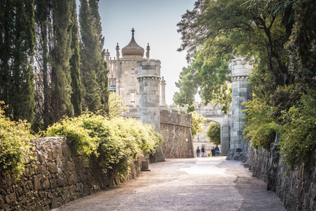 Crimea - May 20, 2016: Alley and entrance to Vorontsov Palace in Crimea, Russia. It is one of main landmarks of Crimea. Scenic view of old architecture of Crimea in Arabic style in summer.のeditorial素材