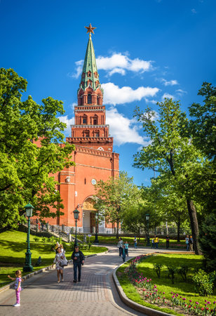 Moscow â May 19, 2019: Scenic view of Moscow Kremlin from Alexander Garden in summer, Russia. Moscow Kremlin is a top landmark of city. People walk next to famous ancient monument in Moscow center.のeditorial素材