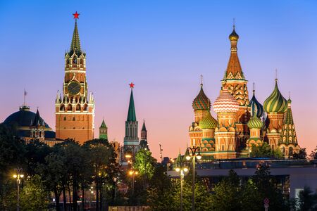 Moscow Kremlin and St Basil`s Cathedral at night, Russia. This place is a top tourist attraction of Moscow. Evening view of the Moscow landmarks in summer. Panorama of the Moscow city center at dusk.の写真素材