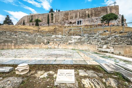 Theater of Dionysus at the foot of Acropolis, Athens, Greece. It is one of the main landmarks in Athens. Panorama of the Ancient Greek ruins in Athens center. Scenic great remains of old Athens city.の写真素材