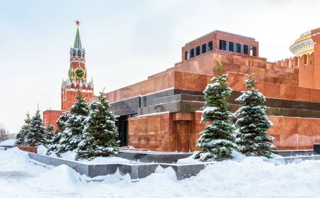 Moscow Red Square in winter, Russia. Lenin's Mausoleum by Moscow Kremlin under snow. This place is a...