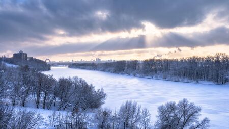 Winter landscape, Moscow, Russia. Scenery of frozen Moskva River covered ice and snow. Panoramic...