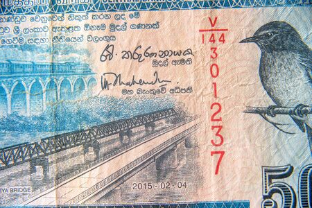 Sri Lanka currency close up. Macro view of 50 rupees bill. Detail of Srilankan banknote with bridge...