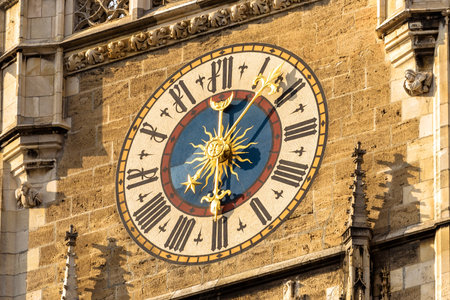 Clock Tower of New Town Hall (Rathaus) close-up, Munich, Bavaria, Germany. It is old landmark of...
