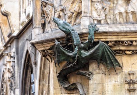 Dragon on facade of Neues Rathaus or New Town Hall in Munich, Bavaria, Germany, Europe. Marienplatz Square is top landmark of Munich. Beautiful detail of old Gothic building in Munich city center.のeditorial素材