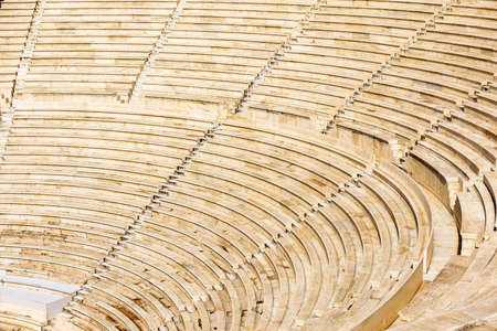 Theater seating at Acropolis foot, Athens, Greece. Detail of ancient Greek Odeon of Herodes Atticus. It is landmark of Athens, monument of classic culture. Restored building in Athens city center.の写真素材
