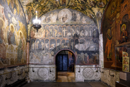 Moscow - June 2, 2021: Archangel Cathedral in Moscow Kremlin, Russia. Beautiful ornate painted interior of Orthodox Church with old frescoes. Inside the luxury Russian cathedral, city landmark.のeditorial素材