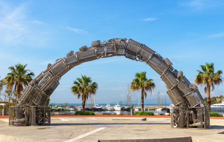 Piraeus, Greece - May 7, 2018: Greek Genocide Memorial in Piraeus, near Athens, Greece. Stainless steel monument, modern sculpture in Alexandra Square. Sightseeing and landmarks in Athens theme.のeditorial素材