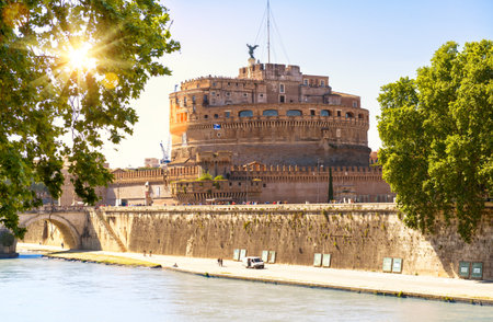Castel Sant'Angelo in Rome, Italy. Scenic view of medieval castle of Sant'Angelo, sun in summer. Scenery of famous Roman monument, old landmark of Roma city. Theme of travel and tourism in Rome.のeditorial素材