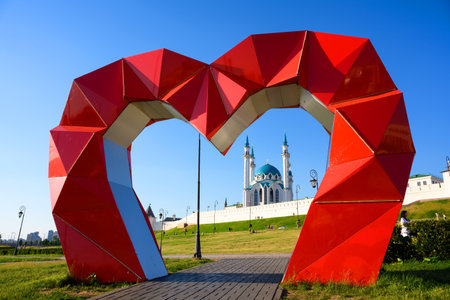 Kazan, Russia - Jun 19, 2021: Heart shaped city decorations near Kazan Kremlin in summer, Tatarstan, Russia. View of Kul Sharif Mosque, landmarks of Kazan. Concept of sightseeing and travel.のeditorial素材