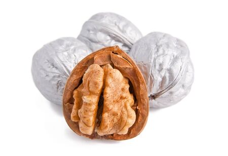 Kernel of silver walnuts is isolated on the white.の写真素材