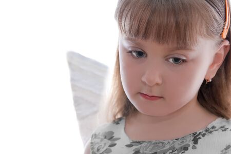 A little girl with angel wings.の写真素材